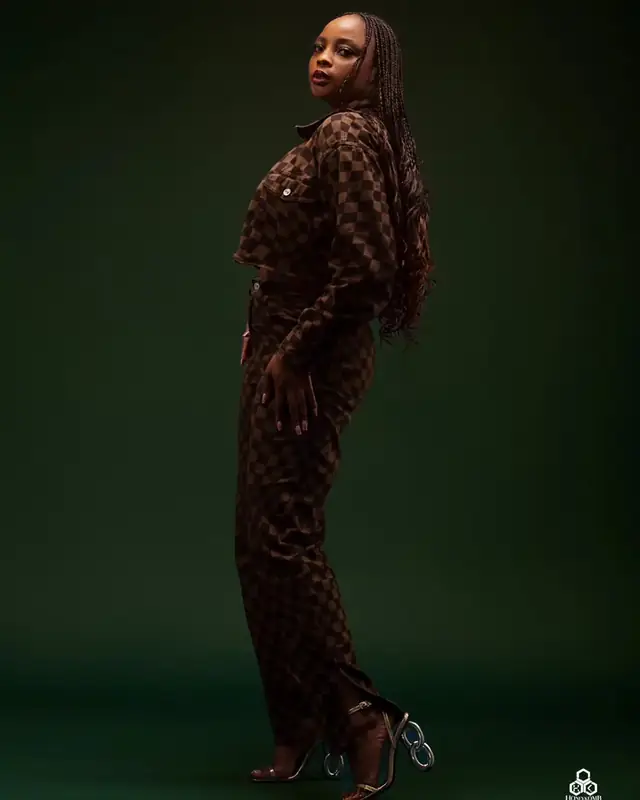 Studio portrait in a patterned suit