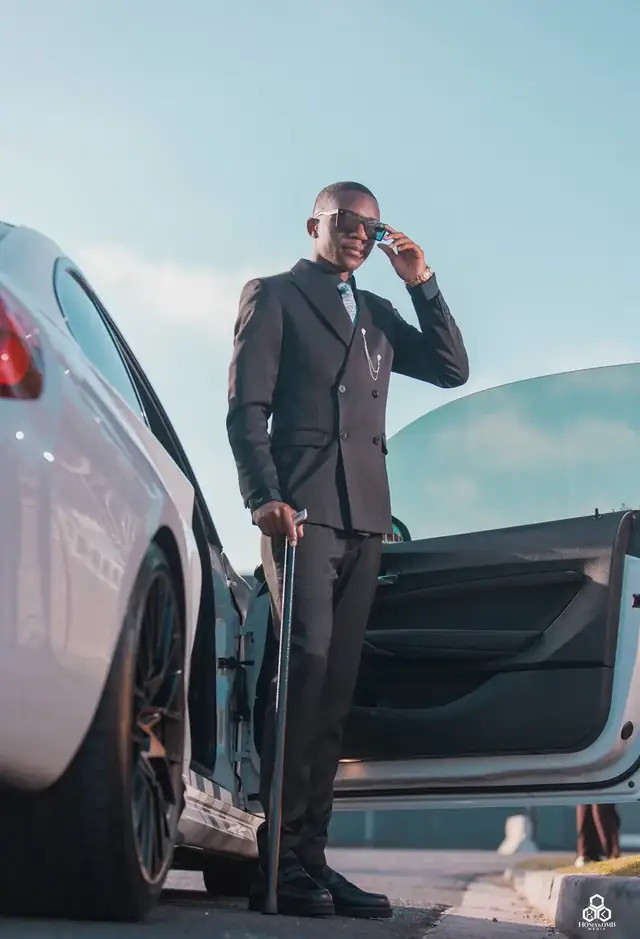 Corporate portrait beside a car